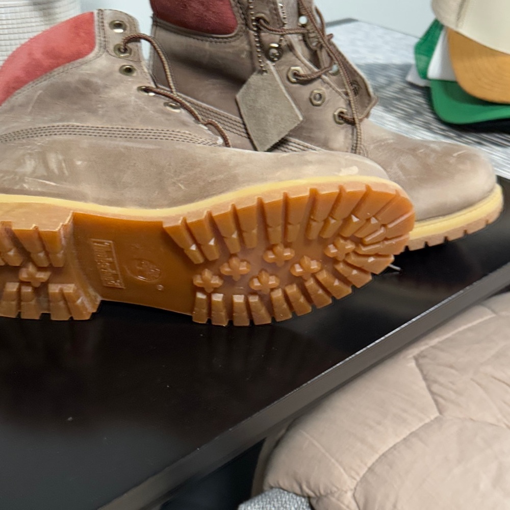 Timberland distressed Brown with Red upper Women’s Boots. Perfect for hiking.